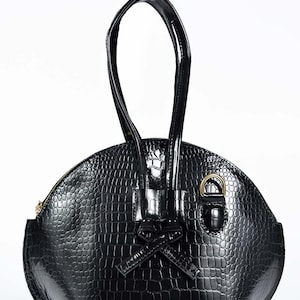 Crocodile style leather handbag