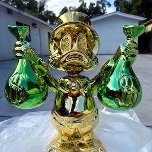 Scrooge McAnka - gyllene kromfigur 40 cm 15,8”