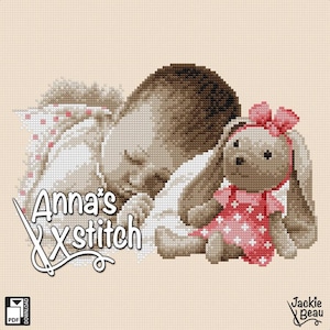 May include: A cross stitch pattern featuring a sleeping baby holding a brown bunny with a pink dress and a pink bow. The pattern is titled "Anna's Xstitch".