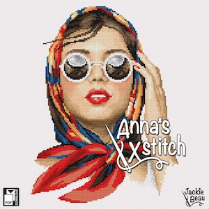 Puede incluir: Patrón de punto de cruz de una mujer con un pañuelo colorido y gafas de sol. El patrón se titula "Anna's Xstitch" e incluye el nombre "Jackie Beau".