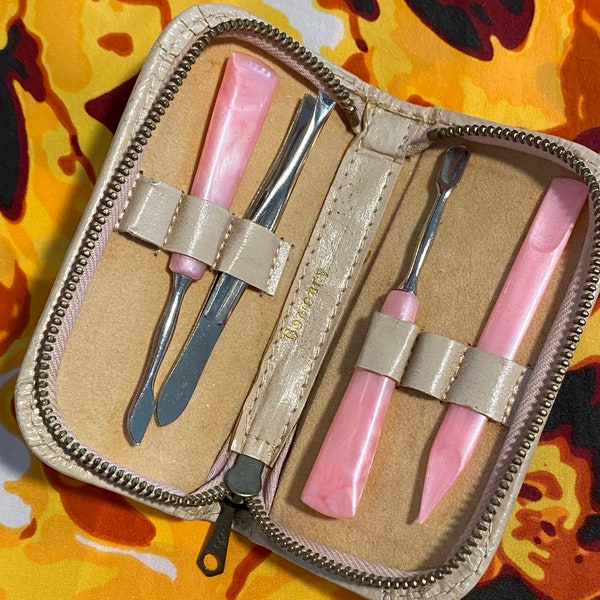 Vintage 60’s plastic pink pearl steel manicure finger nail kit made in Germany leather pouch