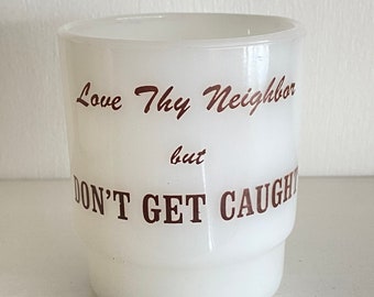 Vintage 60’s rare Anchor Hocking Fire King stackable milk glass adult humor love thy neighbor but don’t get caught collectible kitsch mug