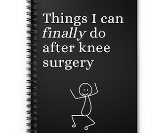 May include: A spiral-bound notebook with a black cover. The cover features white text that reads "Things I can finally do after knee surgery" and a stick figure illustration. The notebook is designed for recording thoughts and experiences.