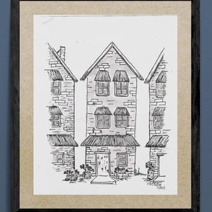 May include: A black and white line drawing of three houses with a central house that has a door and windows. The houses are drawn in a simple style and have a whimsical feel.