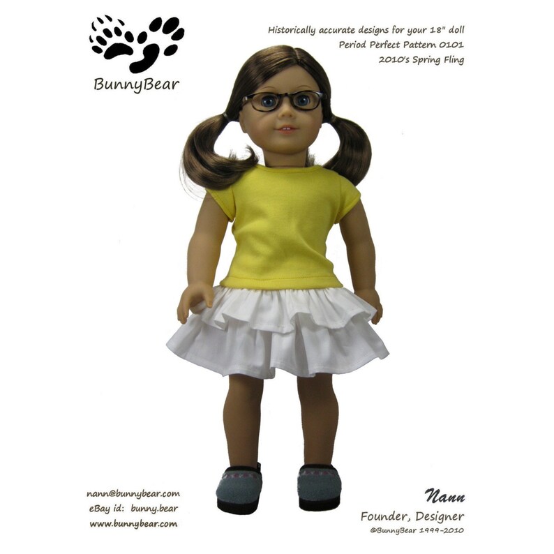 May include: A yellow t-shirt and a white ruffled skirt for a 18-inch doll. The doll is wearing glasses and has brown hair. The text "Period Perfect Pattern 0101" and "2010's Spring Fling" is visible in the image.