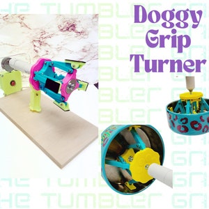 May include: A 3D printed dog toy turner with a yellow, pink, and blue color scheme. The turner is mounted on a wooden base and has a motor to rotate the toy. The toy is a blue and white dog chew toy with a leopard print design.