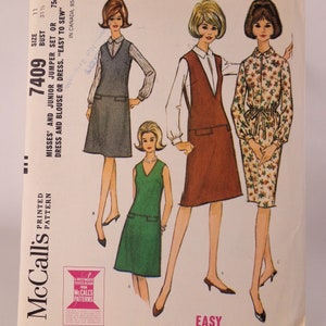 May include: A vintage McCall's sewing pattern with illustrations of dresses and jumpers. The pattern includes a size 11, with a bust measurement of 80 cm. The text reads "Easy to Sew" and "It's Young Fashion!"