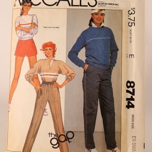 May include: A sewing pattern for a pair of pants with a white stripe down the side. The pattern is from McCall's and is for a miss size, extra small. The pattern is for a pair of pants that are designed to be worn with a top, but the top is not included in the pattern. The pattern is from the Gap.