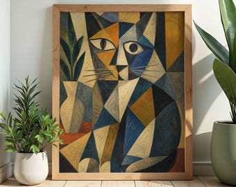 May include: Abstract cat art print in a wooden frame. The artwork features a geometric design with shades of blue, orange, and beige. A vase with plants is on the left side of the cat. The framed art is displayed near potted plants.