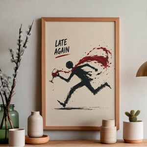 May include: A framed art print with a running figure spilling wine, with the words "LATE AGAIN" above. The black silhouette contrasts with the beige background. The print is displayed on a wooden shelf with decorative items, including a vase and a cactus.