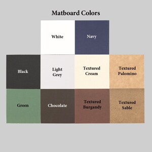 May include: A chart showing 12 different matboard colors. The colors are: white, navy, black, light grey, textured cream, textured palomino, green, chocolate, textured burgundy, and textured sable.