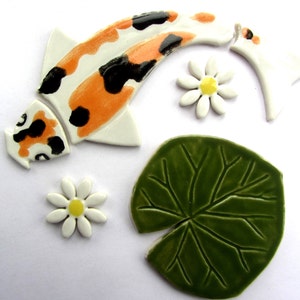 handmade ceramic koi carp lily pad and lily flower tiles, mosaic making, mosaic pieces