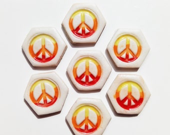 7 ceramic peace symbol tiles. great for mosaics or other craft projects