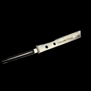 May include: A silver metal blade with a black handle and the text "Willow Tools" engraved on the blade.