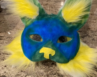 Blauw, groen en geel masker voor buitenaardse katten