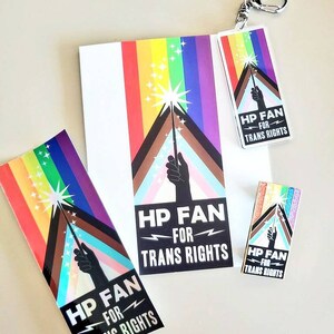 May include: A set of four stickers and a keychain featuring a rainbow flag with a black hand holding a wand with a spark at the top. The text on the stickers and keychain reads "HP FAN FOR TRANS RIGHTS".