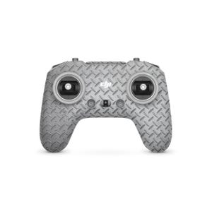 May include: A grey drone controller featuring a diamond plate pattern. The controller has two joysticks, several buttons, and the DJI logo. The design is symmetrical, with a power button and a C1 button.