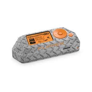 May include: A silver and orange Flipper device with a diamond plate texture. The device has an orange screen displaying a cartoon character and the text "Need an SD card". The word "FLIPPER" is printed in orange.