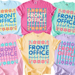 May include: Six short-sleeved t-shirts in light blue, pink, mint green, soft pink, yellow, and lavender. Each shirt features a central graphic with the text FRONT OFFICE, a specific job title, and a background of vertical stripes and flowers.