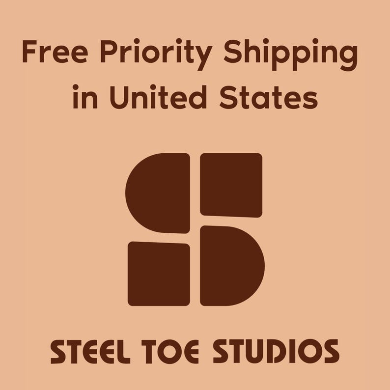 May include: A logo for Steel Toe Studios, featuring a brown abstract design of four connected shapes on a peach background. The text "STEEL TOE STUDIOS" is below the logo in brown.