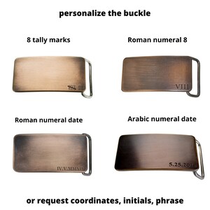 May include: Four bronze-colored belt buckles with different personalized designs. One has 8 tally marks, another has the Roman numeral VIII, a third has the Roman numeral date IV.V.MMXIV, and the last has the date 5.25.2014. The text "personalize the buckle" is at the top.
