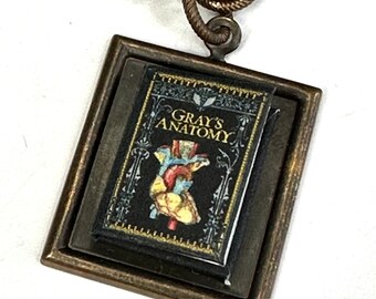 Gray’s Anatomy Hidden Book Necklace with illustrated pages