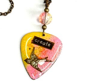 Guitar Pick Necklace CREATE  embedded in yelliw and pin background with Glitter Accents , Long Layering Necklace