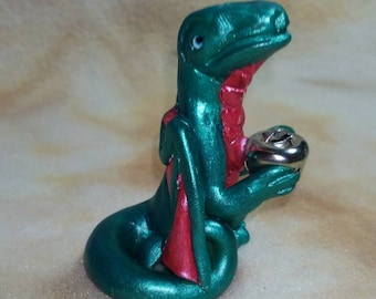 Christmas cheer dragon with bell polymer clay sculpture red and green