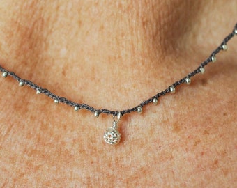 Tiny 4mm silver filigree ball charm on daintiest crocheted beaded necklace with silver and dark brown strand