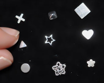 One tiny sterling silver stud earring—shapes to mix and match!