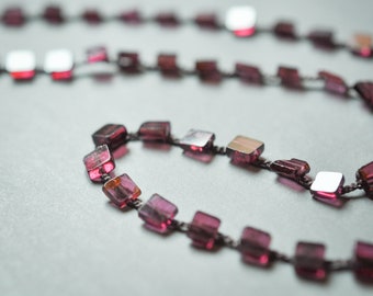 A simple and elegant necklace of garnet squares