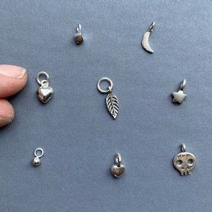 One tiny sterling silver pendant or charm to add to itty bitty necklace or bracelet