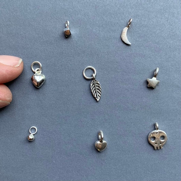 One tiny sterling silver pendant or charm to add to itty bitty necklace or bracelet