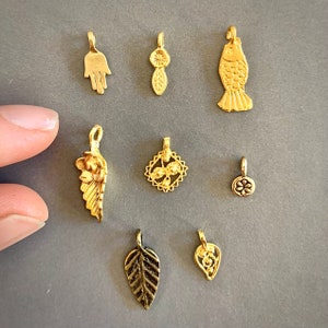 Tiny gold tone pendant or charm to add to itty bitty necklace or bracelet