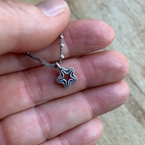 One tiny sterling silver pendant or charm to add to itty bitty necklace or bracelet Outline starfish