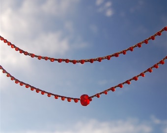 Infinity: simple claspless crocheted necklace in red