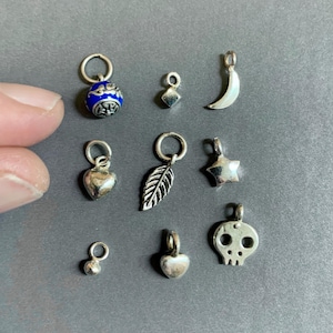One tiny sterling silver pendant or charm to add to itty bitty necklace or bracelet