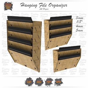 May include: A set of three ceramic mugs with a speckled, matte finish. The mugs are in shades of cream, light gray, and dark gray. Each mug has a simple, minimalist design and a rounded handle.