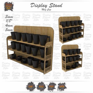 May include: A wooden display stand for mugs, with three shelves. The stand holds several black mugs and saucers. The text "Display Stand Mug Cup" is at the top. The stand is 3mm, 4mm, and 5mm thick.