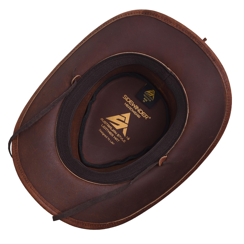 May include: A brown leather cowboy hat, viewed from the inside, with a dark brown interior and a black band. The hat features the text "Sidewinder Headwear" and "Australian Style Leather Hat".