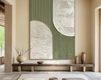 May include: Abstract wall art with a green and white color scheme. The art features a textured white background with two overlapping circles and a green striped pattern.
