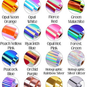K&ouml;nnte beinhalten: Das Bild zeigt Rollen von holografischem Vinyl in verschiedenen Farben, darunter Opal Neon Orange, Opal White und Fierce Red. Weitere Farben sind Peach Yellow Pink und Hyacinth Blue. Der Text "HOLOGRAPHIC COLORS" befindet sich oben.