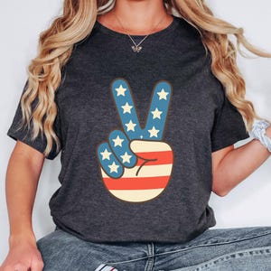 La paix aux États-Unis | Vibes étoilées | signe de paix patriotique | Détendez-vous aux États-Unis | Doigts de la liberté et de la paix | Ambiance américaine | T-shirt cool américain