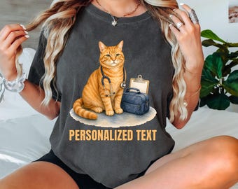 Comfort Colors® Personalized Ginger Nurse Cat Shirt, Custom Healthcare Kitty Name Tee, Orange Tabby RN Gift, Caregiver Appreciation T-Shirt