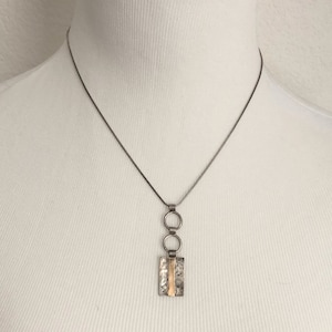 Vintage oxidized silvertone and brass geometric necklace pendant