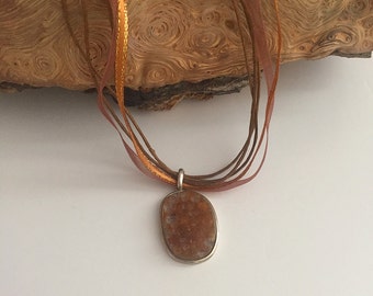 Silver and raw rust agate necklace pendant