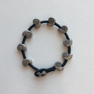 Black and silvertone shell bracelet  - beach jewelry - nautical cord and antiqued silver bracelet