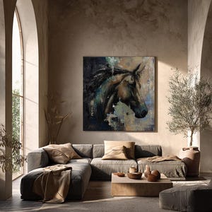 May include: A square wall art painting featuring a dark, textured profile of a horse head in shades of brown, black, and blue. The artwork is displayed on a neutral-toned wall above a low-profile grey sectional sofa with tan cushions.