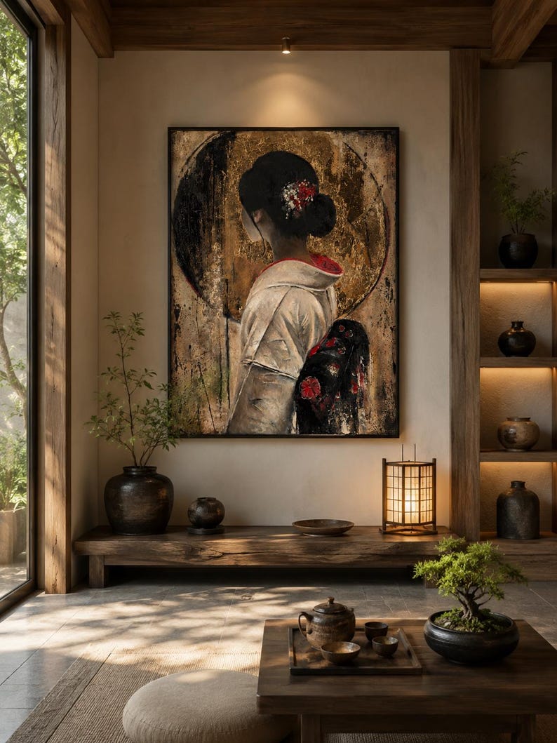 May include: A large rectangular wall art piece featuring a portrait of a person seen from behind, wearing a white kimono with a black and red floral obi. The background includes a large gold circle and textured dark tones, framed in black.