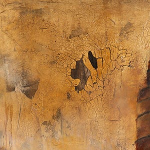 May include: A rectangular painting featuring a heavily textured surface with a cracked, golden-brown finish. The composition displays layers of ochre, bronze, and dark brown tones, with a prominent central fissure revealing a dark, deep void.